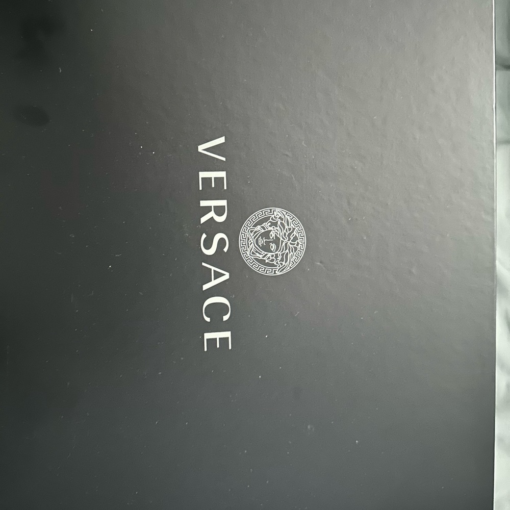 Black medusa Versace combat boots